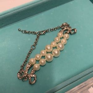 Pearl and rhinestone bracelet with bow detail